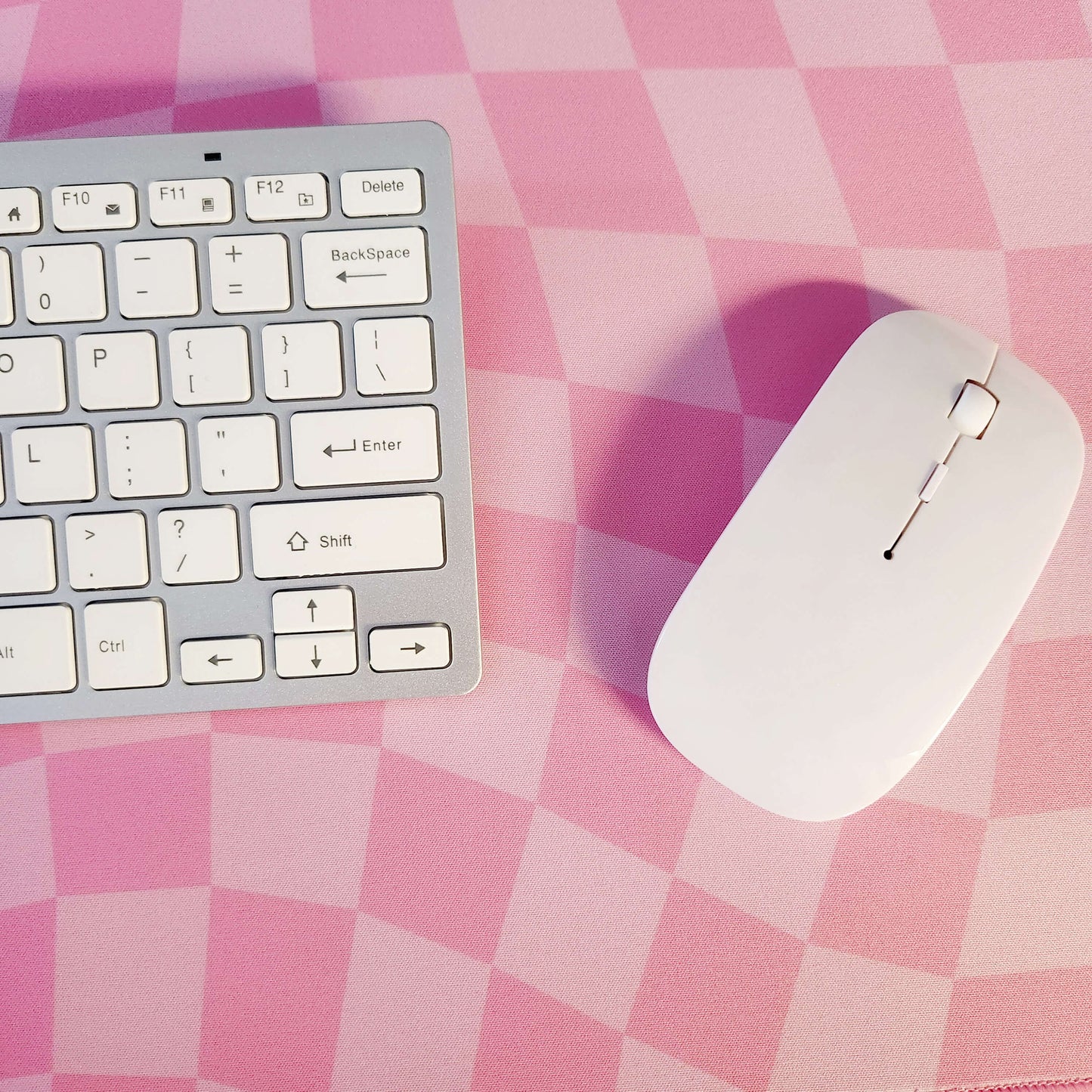 Warped checkerboard desk mat - pink