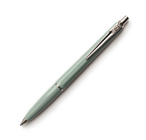 Light olive green pen with silver accents on a white background