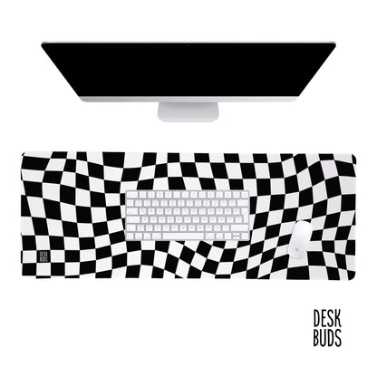Monochrome warped checkerboard desk mat
